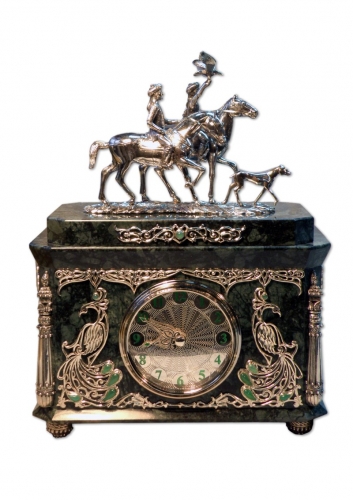 s-230. <br>  Clock «Hunting with eagle and dog». <br>  Silver 925 test. 498 grams. Natural Jasper. Carnelian and Chrysoprase.  Enamel. Height 22 cm.